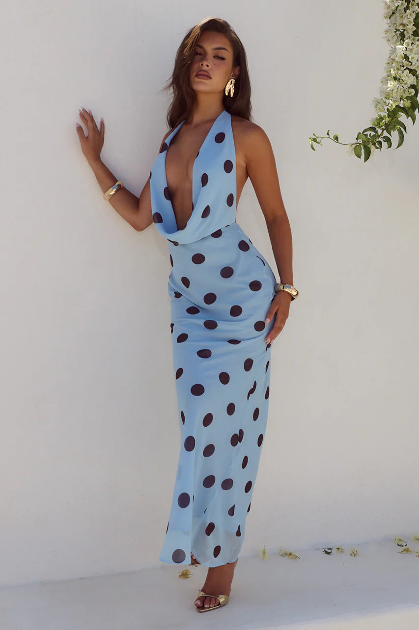 Three-quarter view, Runaway The Label Lexie Sky Blue Polka Dot maxi dress, draped halter, fitted silhouette